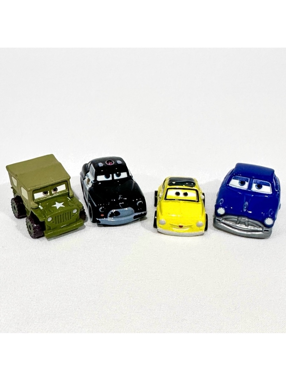 Disney Cars 3 Die-cast Mini Racers Doc Hudson, Sheriff, Luigi, Sarge Mattel 2016